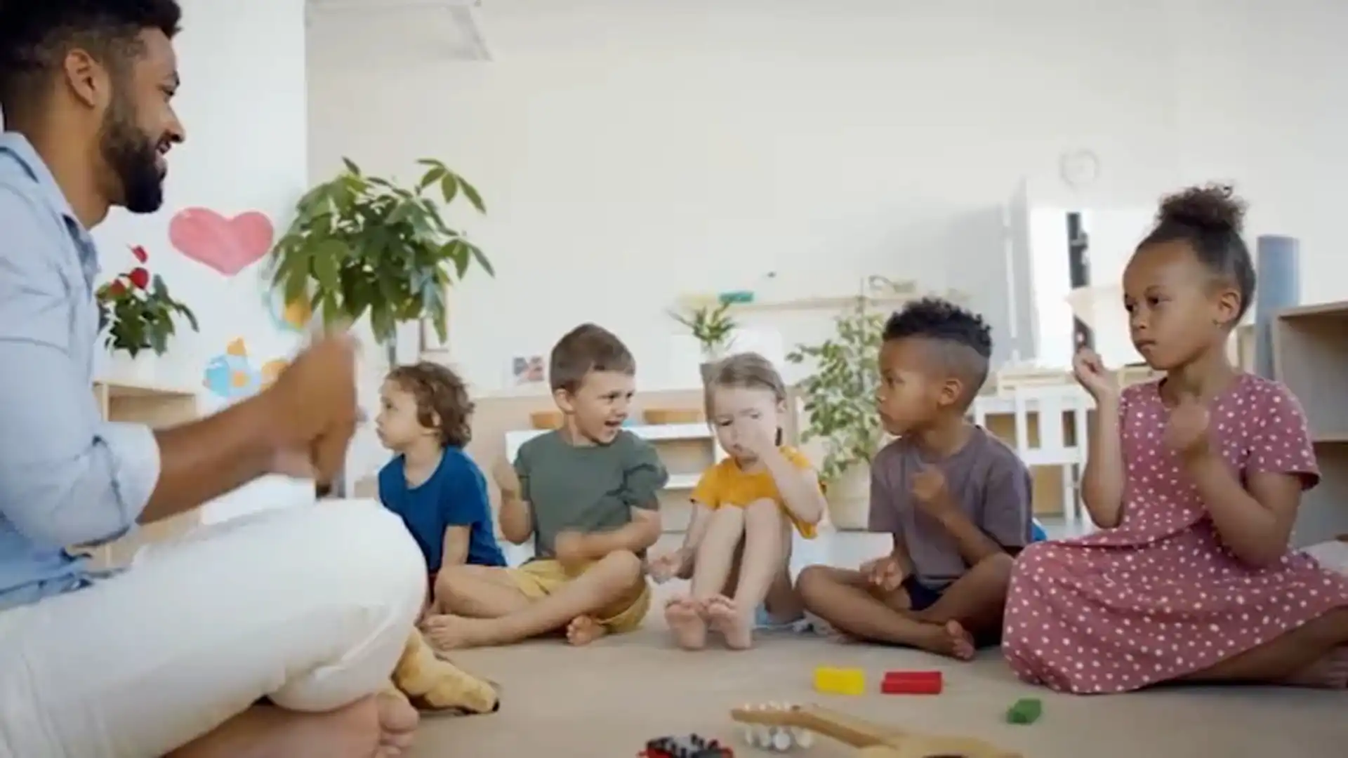 Families waiting at a child care center affected by funding issues.