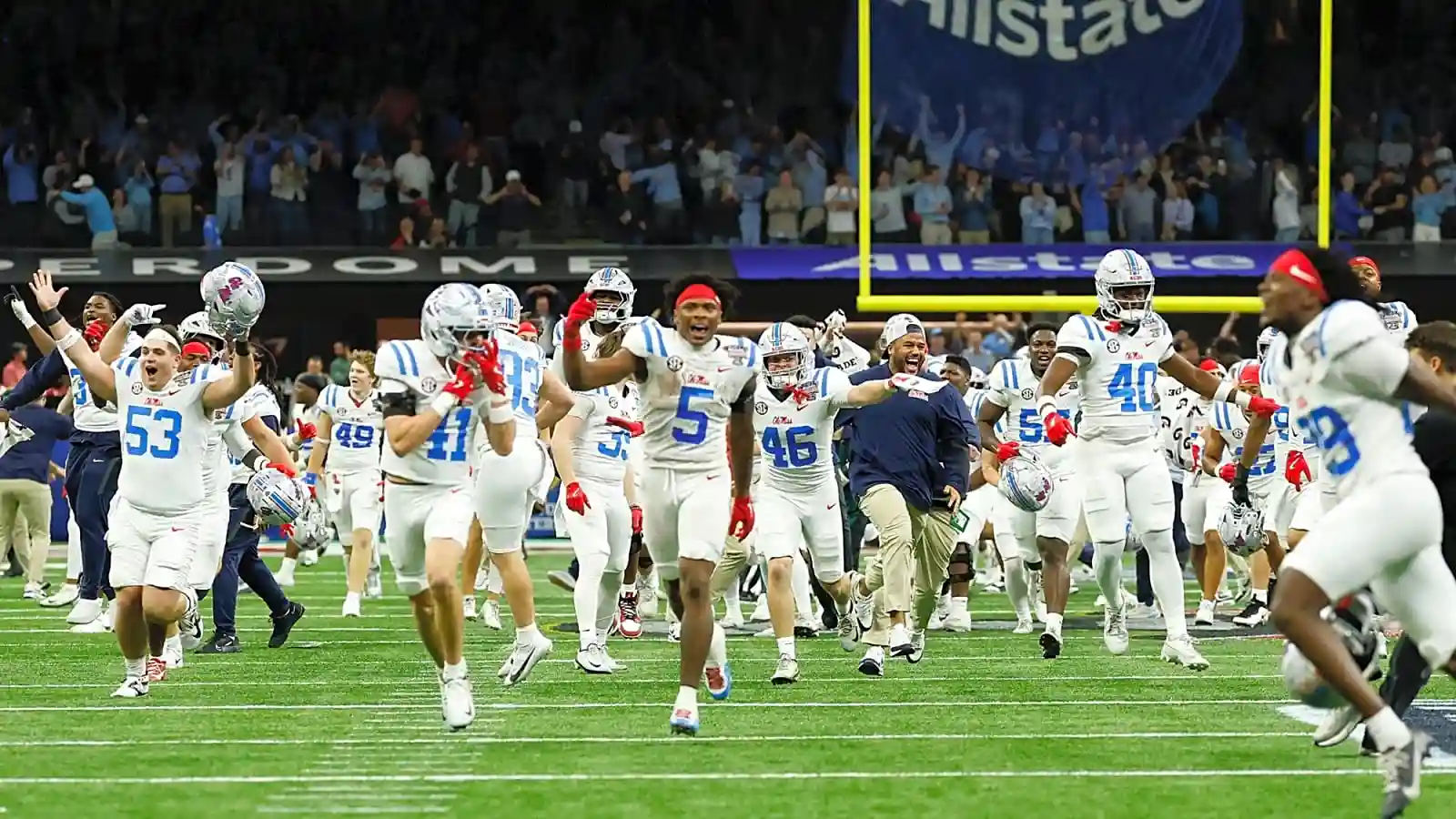 Ole Miss Rebels players celebrate on the field after a dramatic comeback win over Georgia at the Sugar Bowl in New Orleans